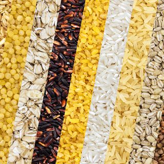 Collection of different cereals, grains, rice and beans backgrounds
