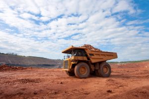 big yellow mining truck at work site