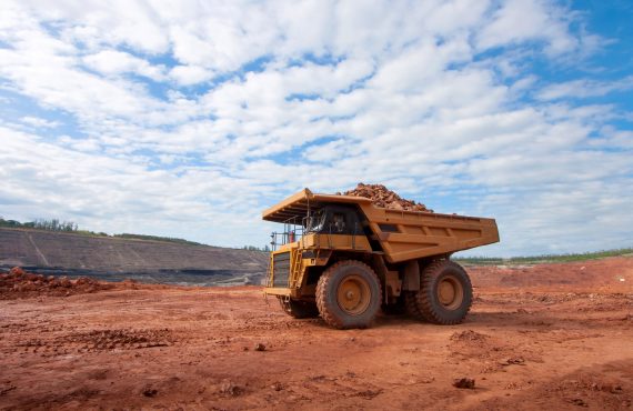 big yellow mining truck at work site